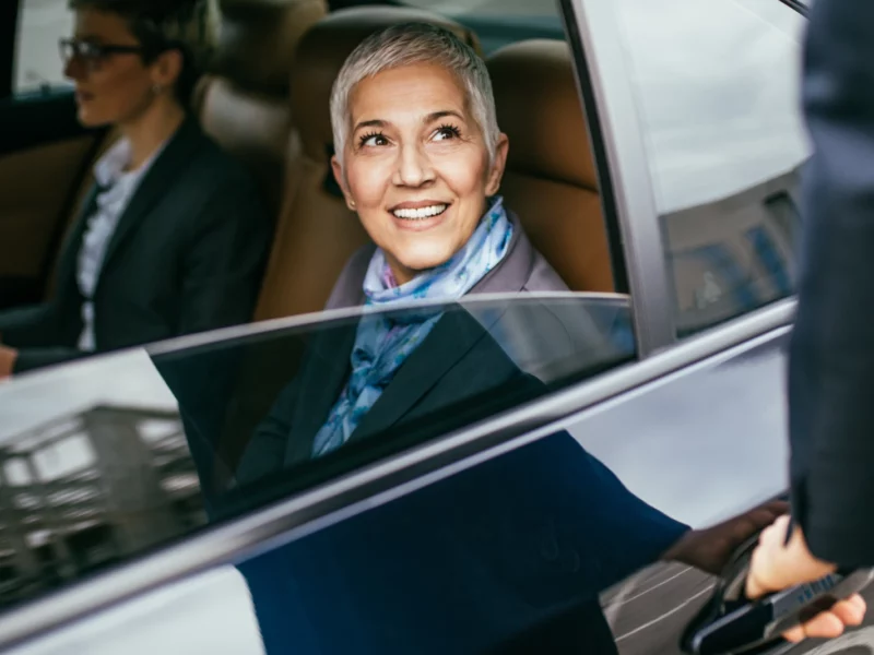 Women exiting limo