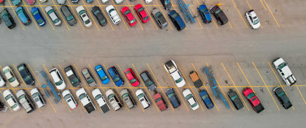 Car fleet in parking lot insurance