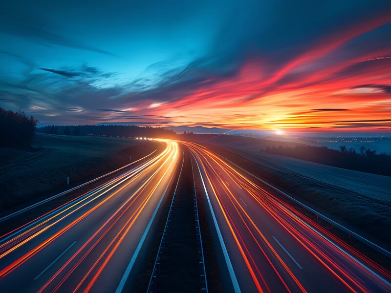highway at night with streaks of car lights
