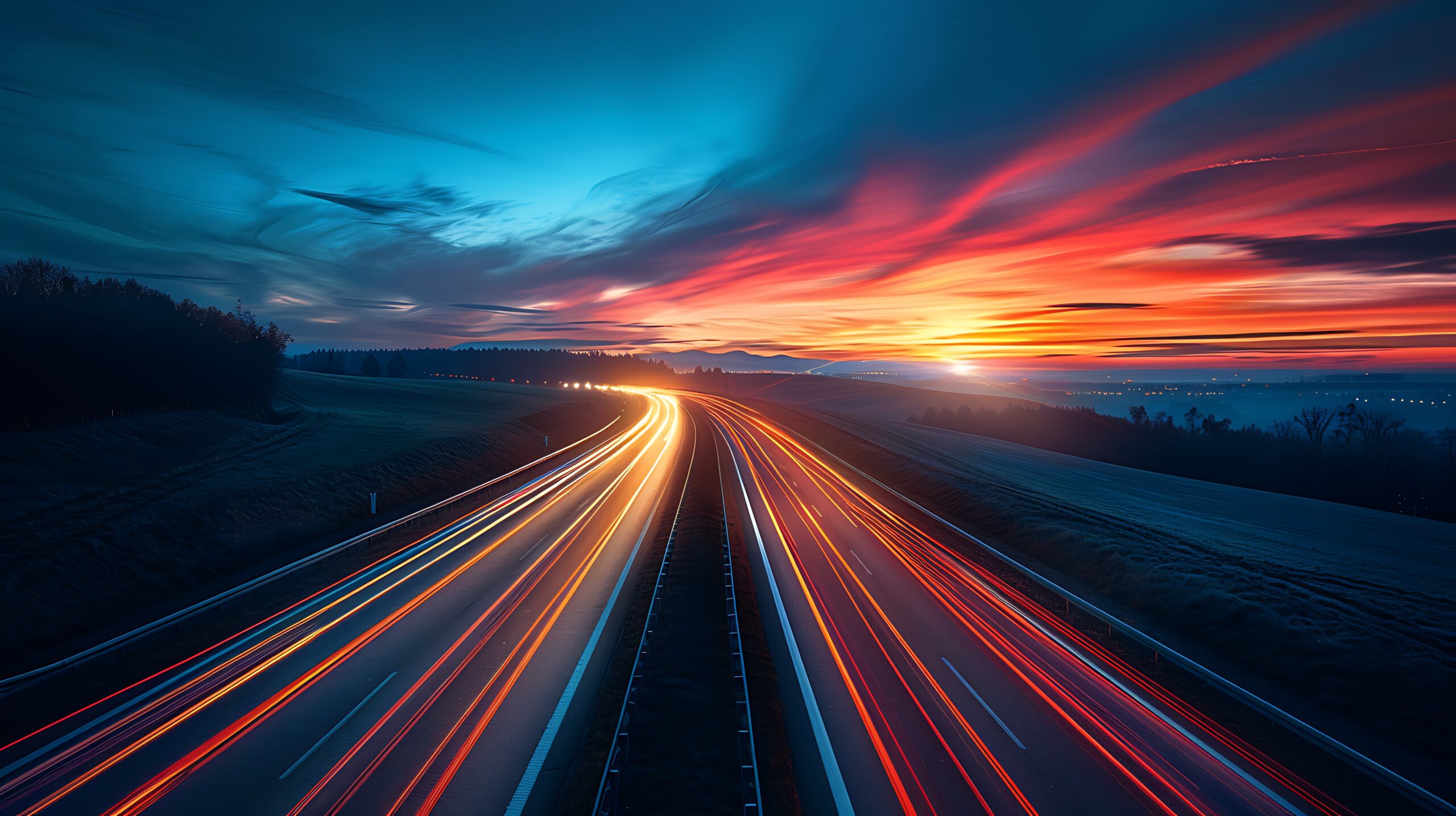 highway at night with streaks of car lights